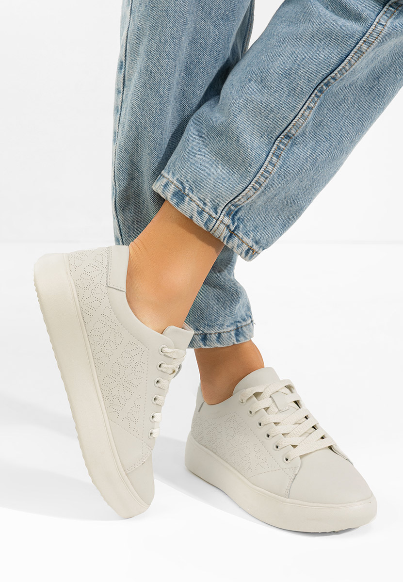 Levně Béžové kožené dámské sneakersy Ciandra